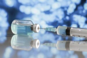 Medical vial and syringe.